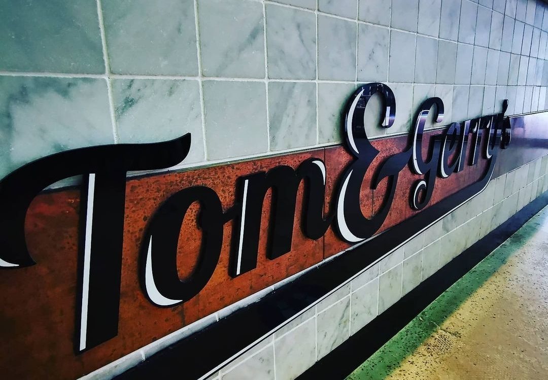 Tom & Gerry's marble signage